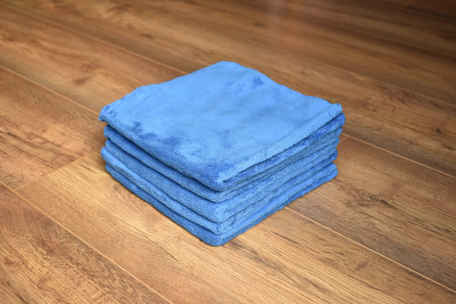 KHEMIA PLUS Plush 380 GSM coral fleece microfiber towel folded display - color blue, edgeless plush construction