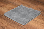 KHEMIA PLUS The Daily premium 365 GSM edgeless microfiber towel folded display - color dark grey
