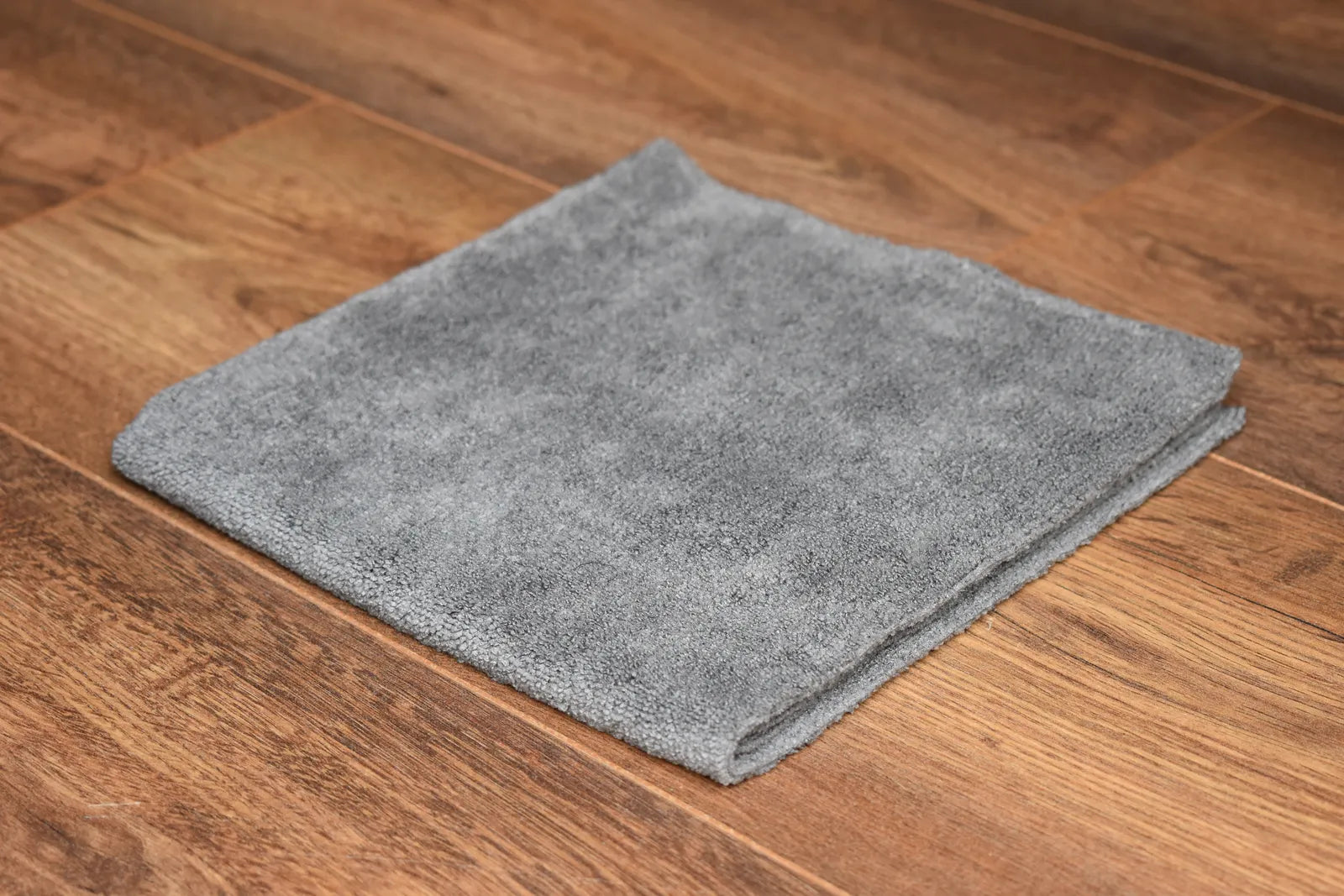 KHEMIA PLUS The Daily premium 365 GSM edgeless microfiber towel folded display - color dark grey