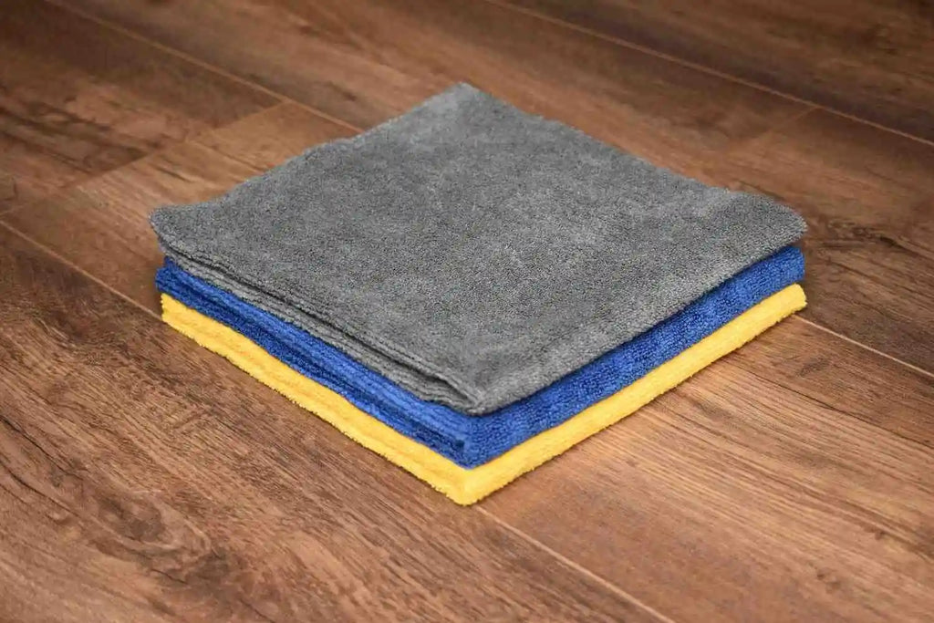 KHEMIA PLUS The Daily microfiber towels folded display - dark grey, royal blue, and golden yellow color options