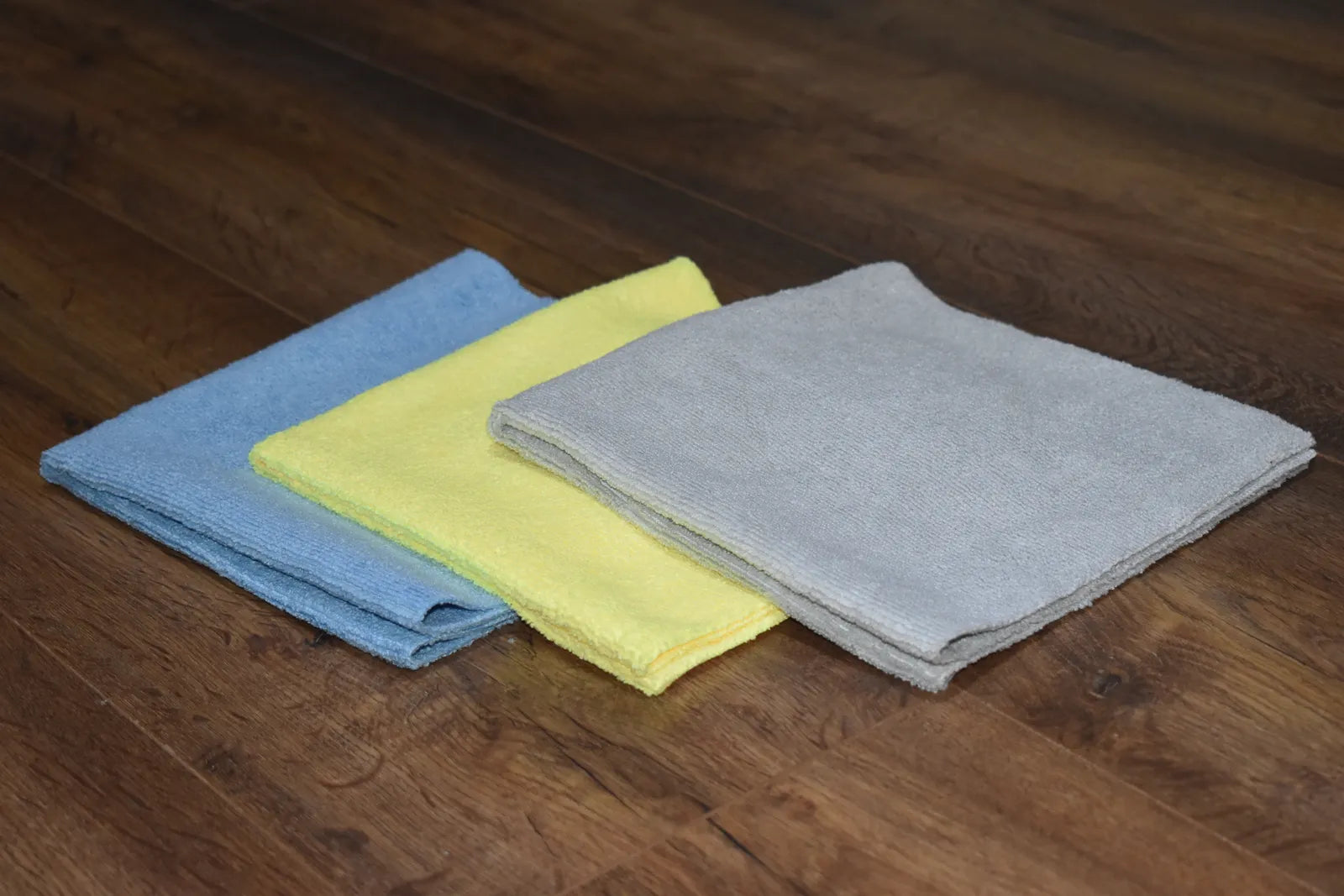 KHEMIA PLUS PREMIUM-300 microfiber towel 300 GSM 70/30 edgeless display in sky blue, yellow, and ice grey color options