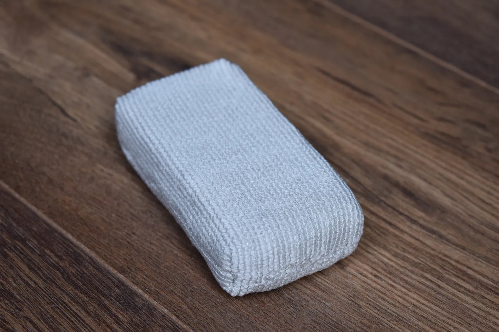 Pearl Weave applicator pad top view showing closed-loop microfiber surface - small format for precision ceramic coating work