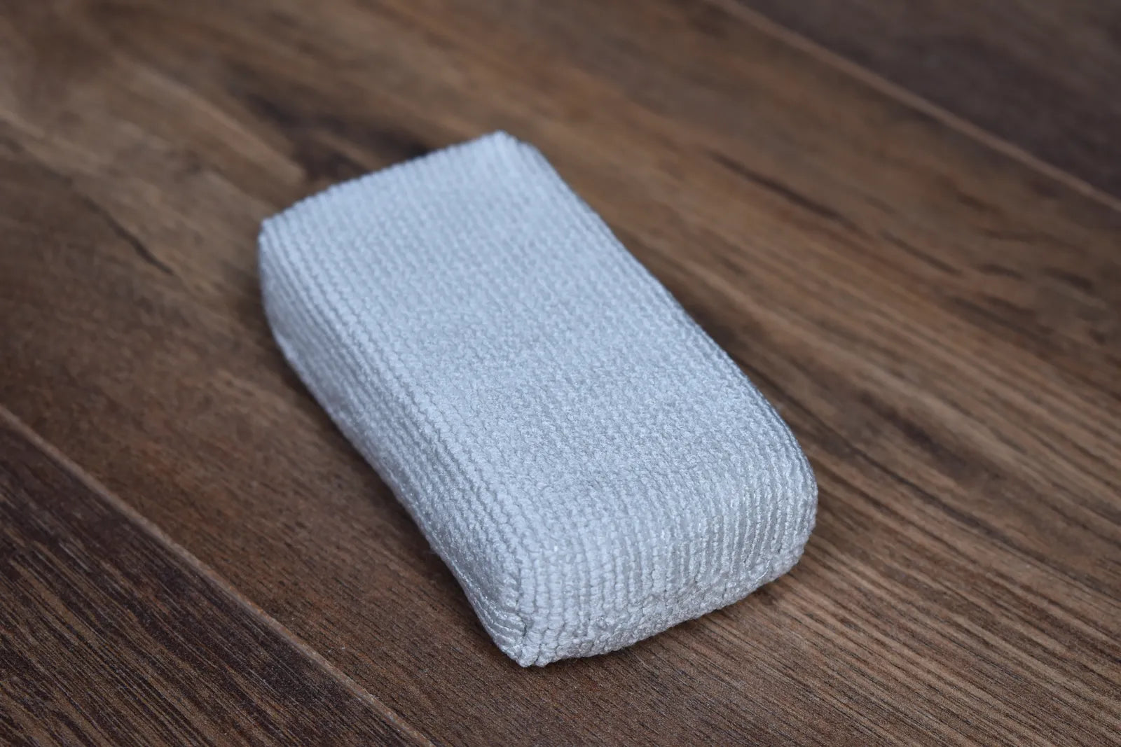Pearl Weave applicator pad top view showing closed-loop microfiber surface - small format for precision ceramic coating work