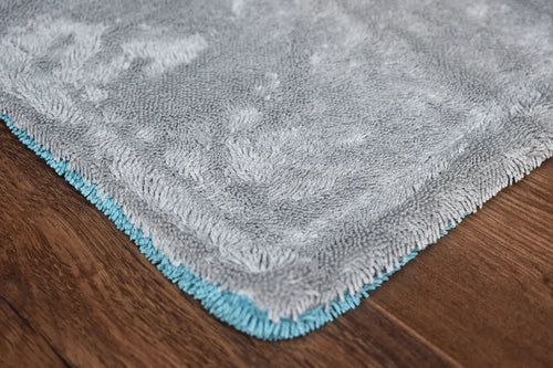 KHEMIA PLUS DRY-1100 1100 GSM dual-layer microfiber drying towel folded display - aqua blue side, twist-loop weave for car drying