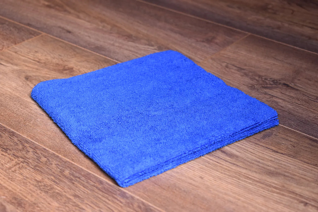 KHEMIA PLUS Light Terry 245 GSM edgeless microfiber towel folded display - color blue