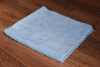 KHEMIA PLUS Light Terry 245 GSM edgeless microfiber towel folded display - color sky blue